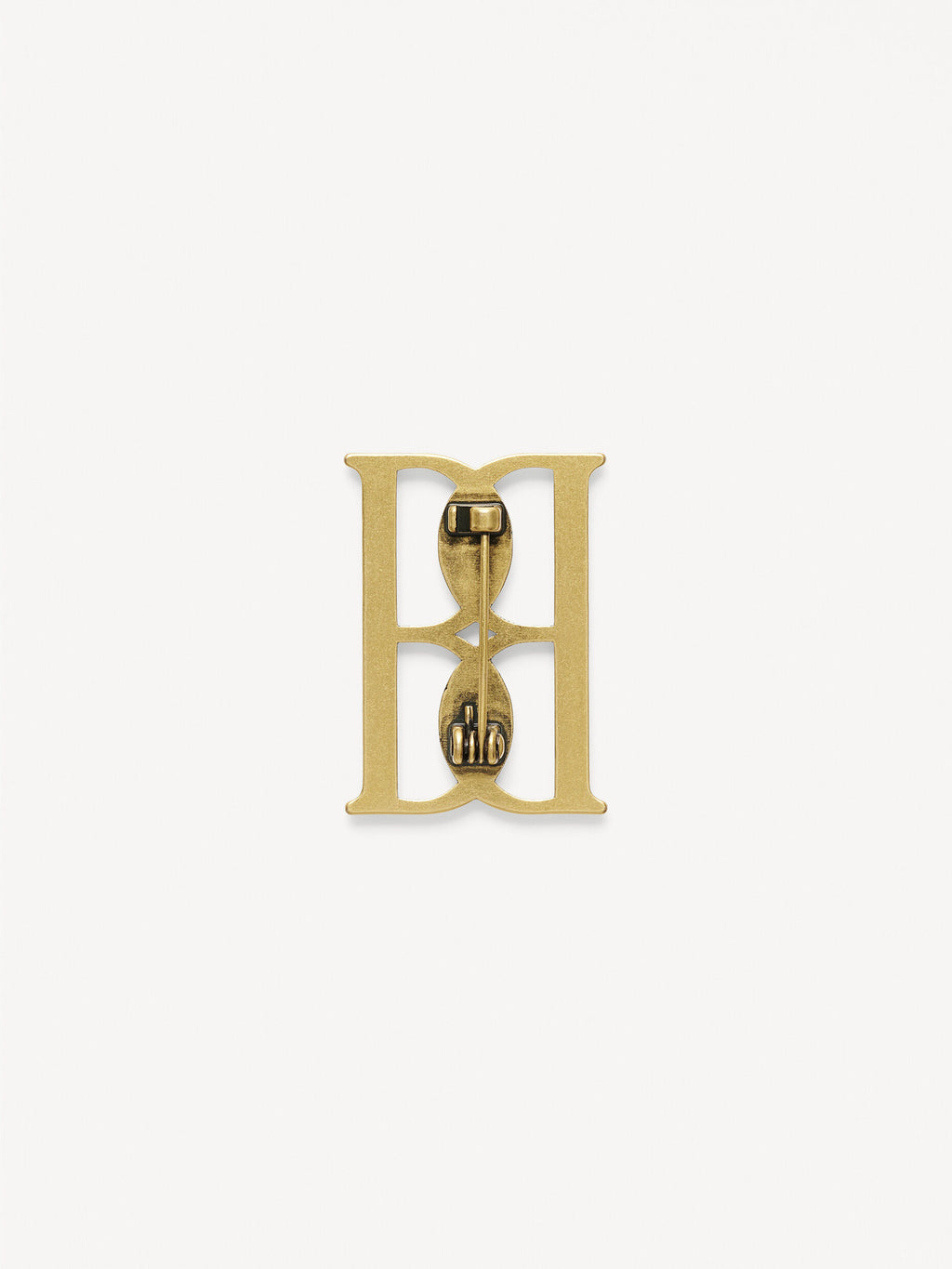 Mono small gold-tone brooch