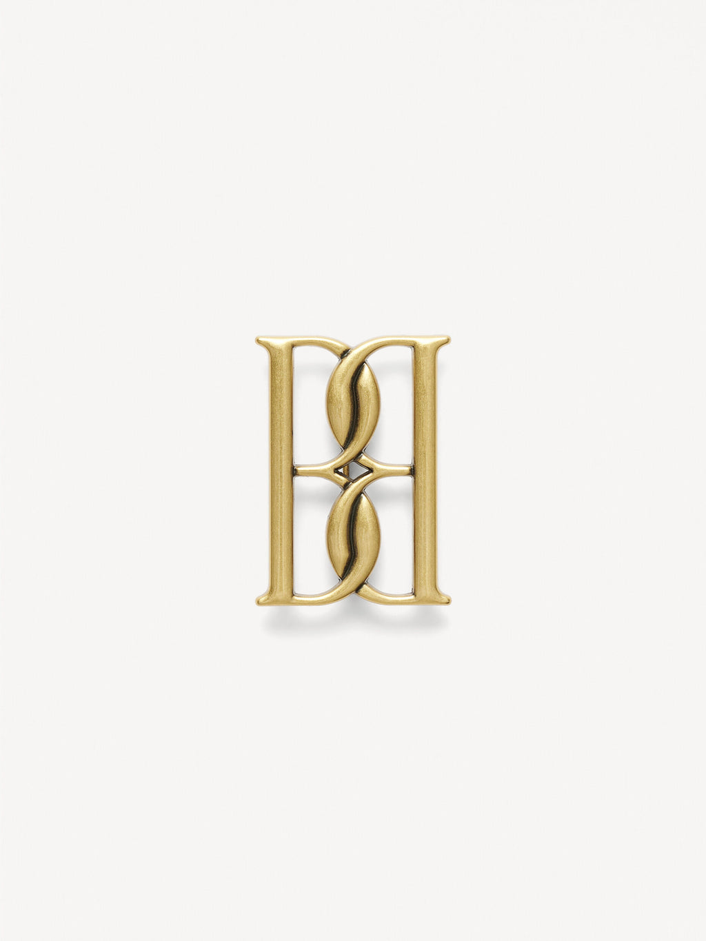Mono small gold-tone brooch