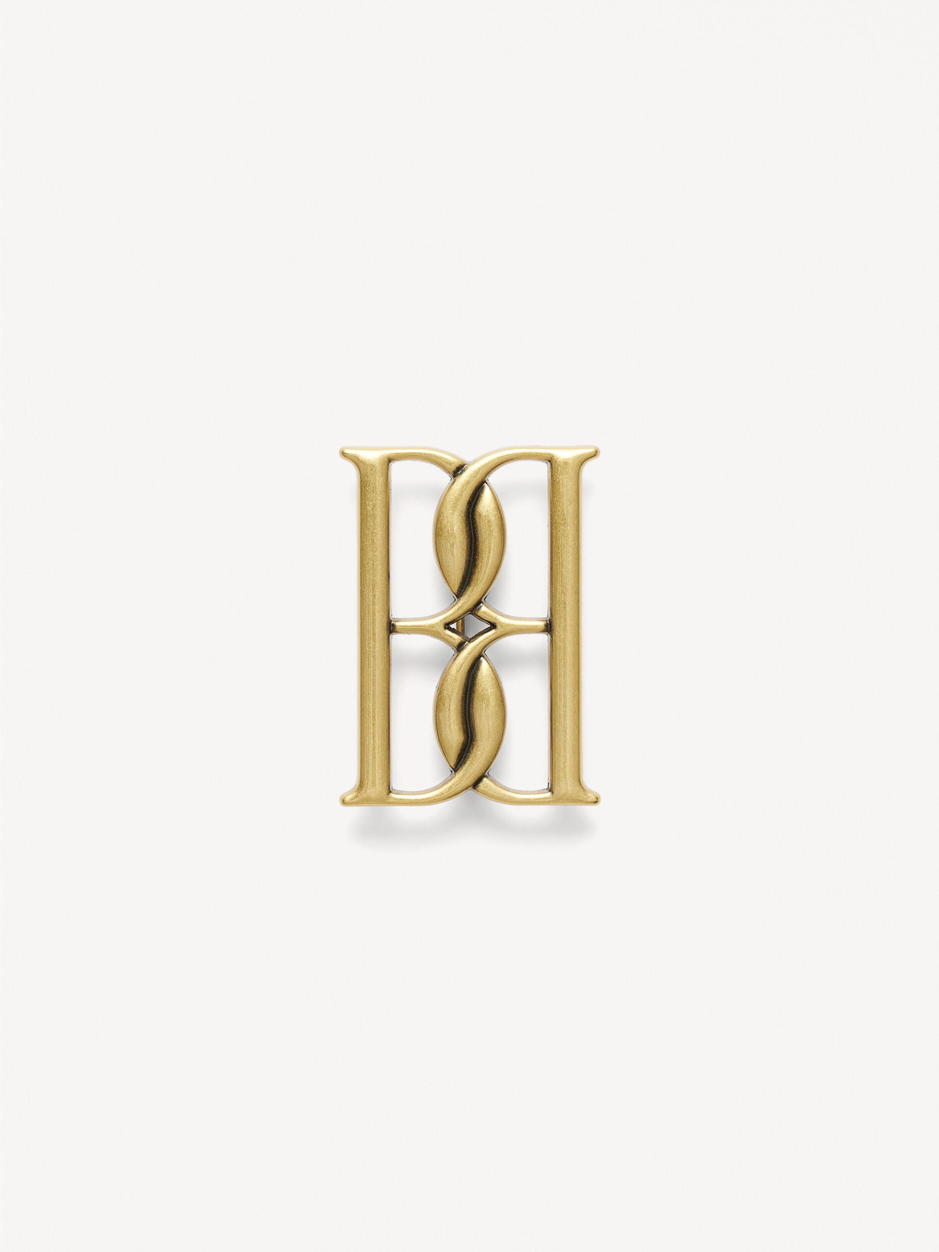 Mono small gold-tone brooch